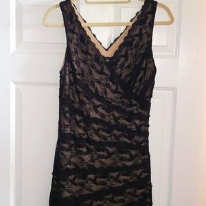 Black lacey dress with subtle black beading, nude